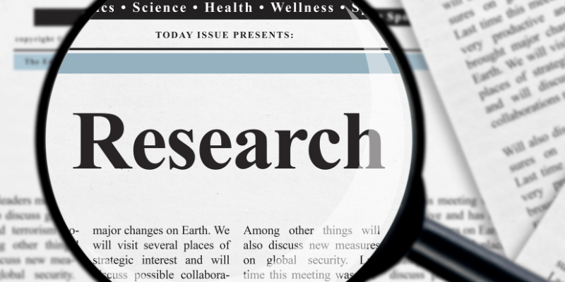 Research and a magnifying glass.