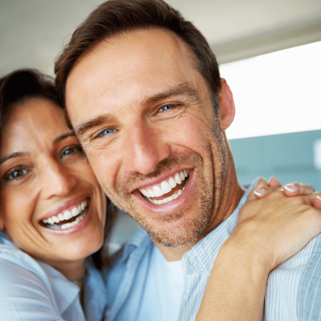 A smiling man and woman 