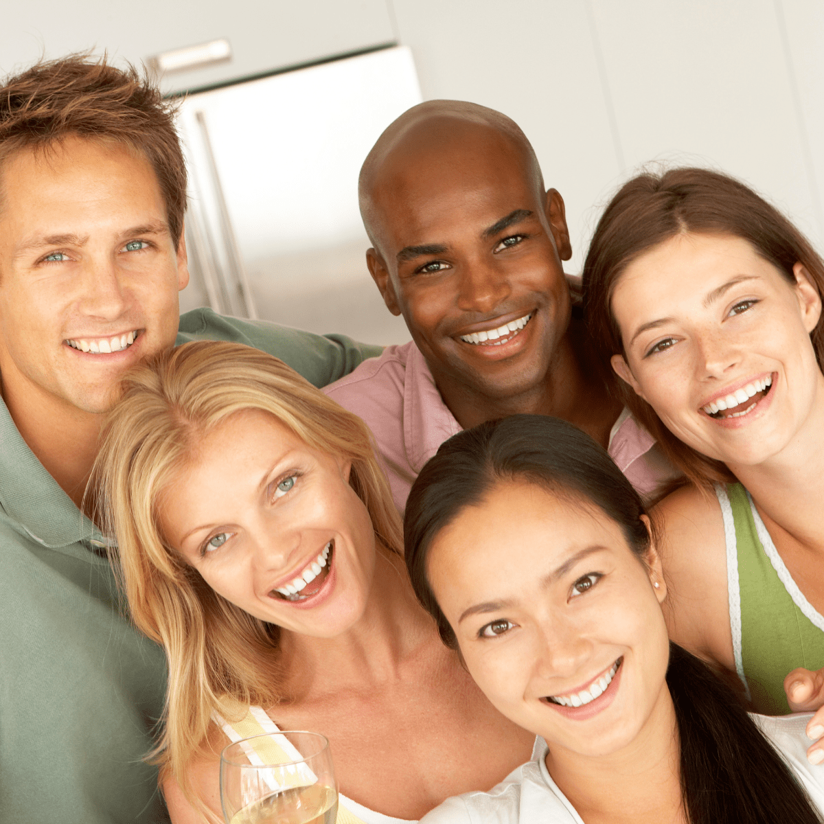 smiling men and women