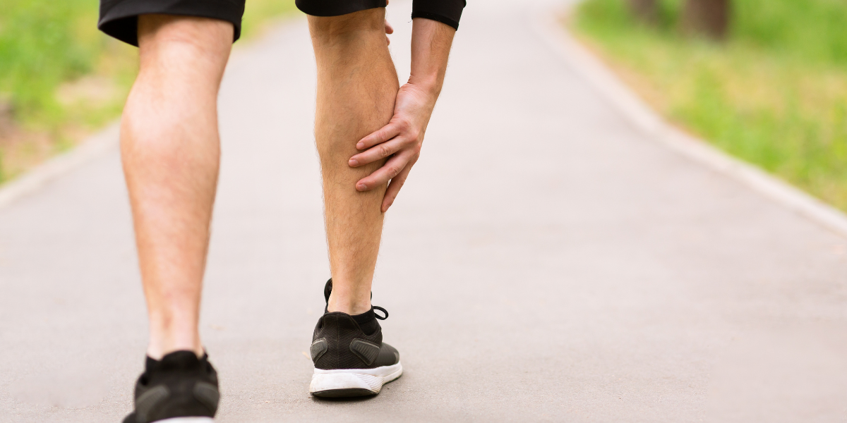 A man with muscle cramps