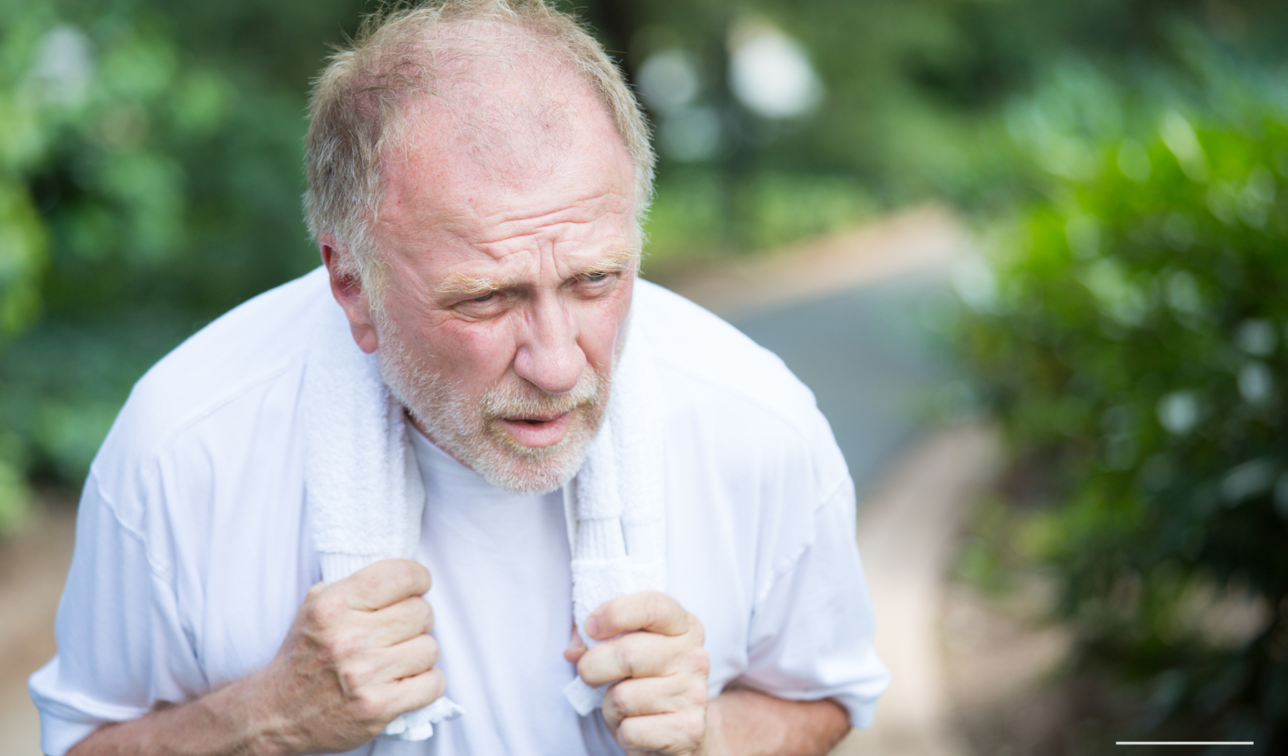 An older man exercising.