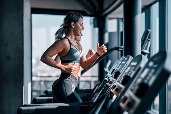 A woman running on a treadmill