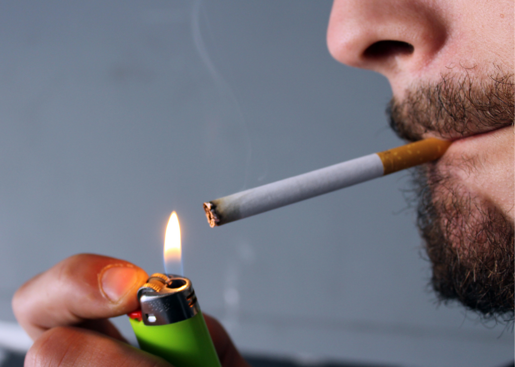 A man smoking a cigarette