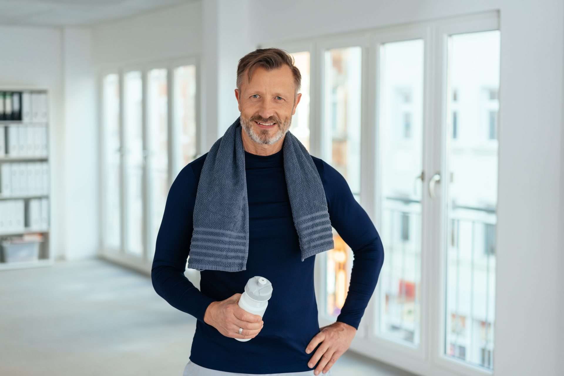 Smiling Friendly Athletic Middle-aged Man with Decreased Sex Drive In Men