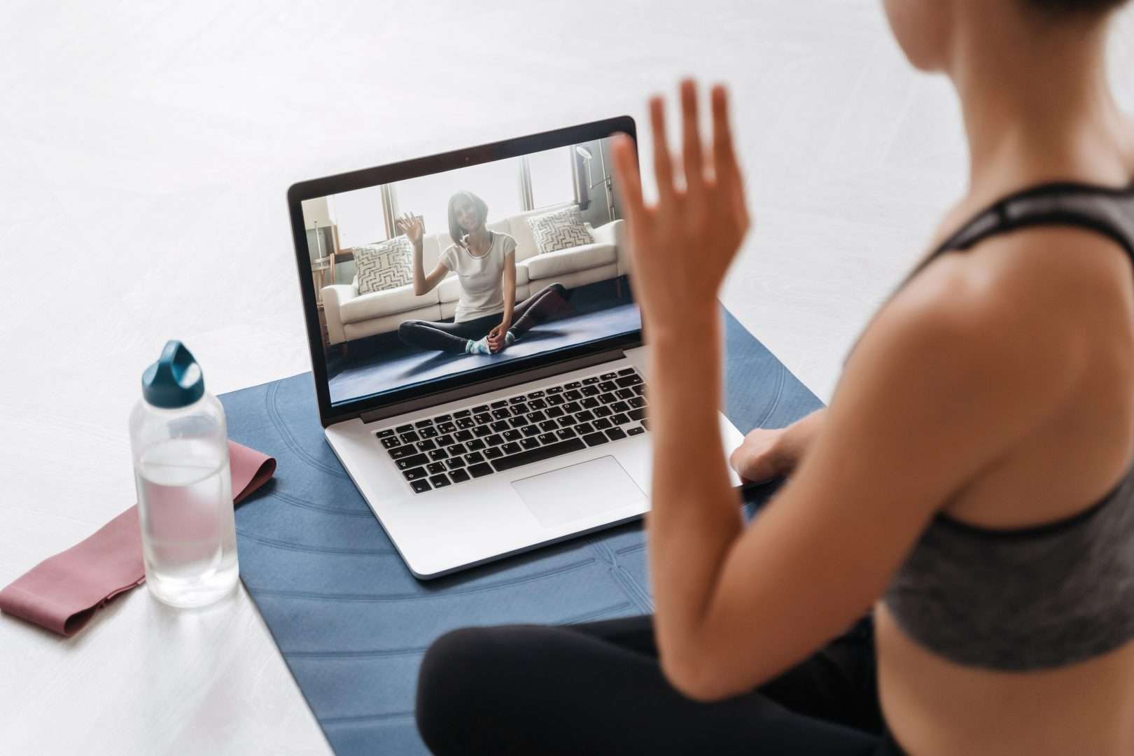 Young fit woman having a meeting with online weight loss clinics