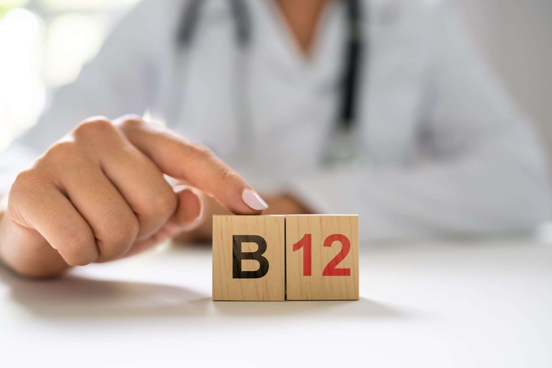 A doctor with tiles that say B12