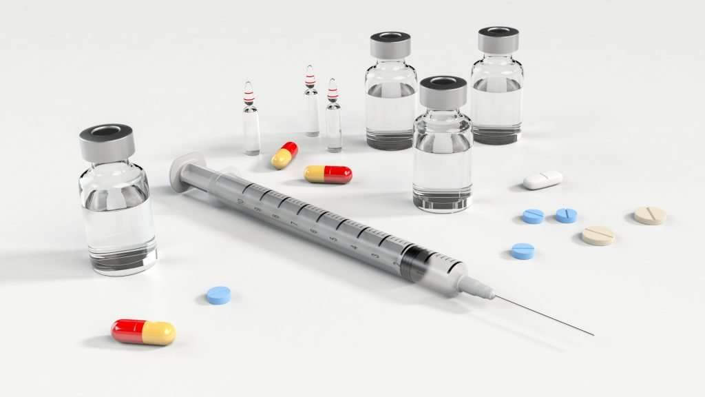 Syringe and Vials of Medication